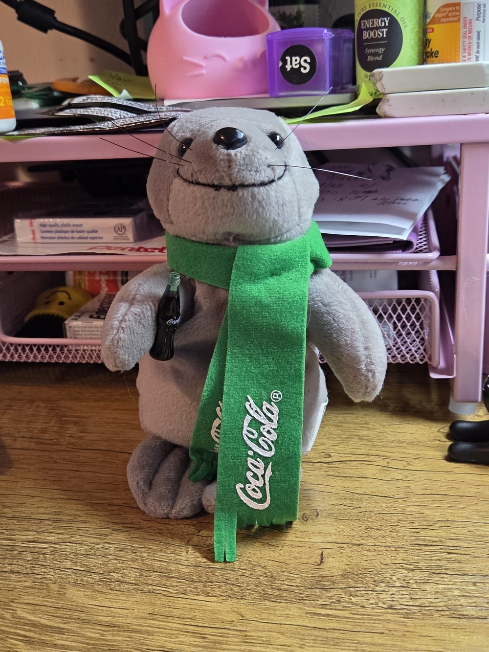 Coca Cola Gray Plush Seal with Green Logo Scarf and Bottle Charm